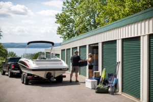 Boat being prepared for storage near a storage facility